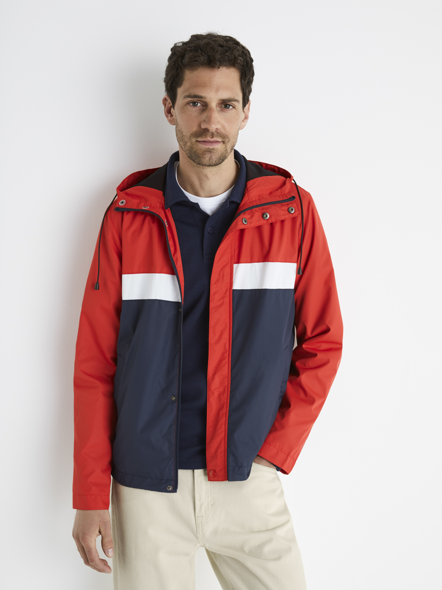Fotografie Modro-červená pánská lehká bunda s kapucí Celio Bulle - XXL